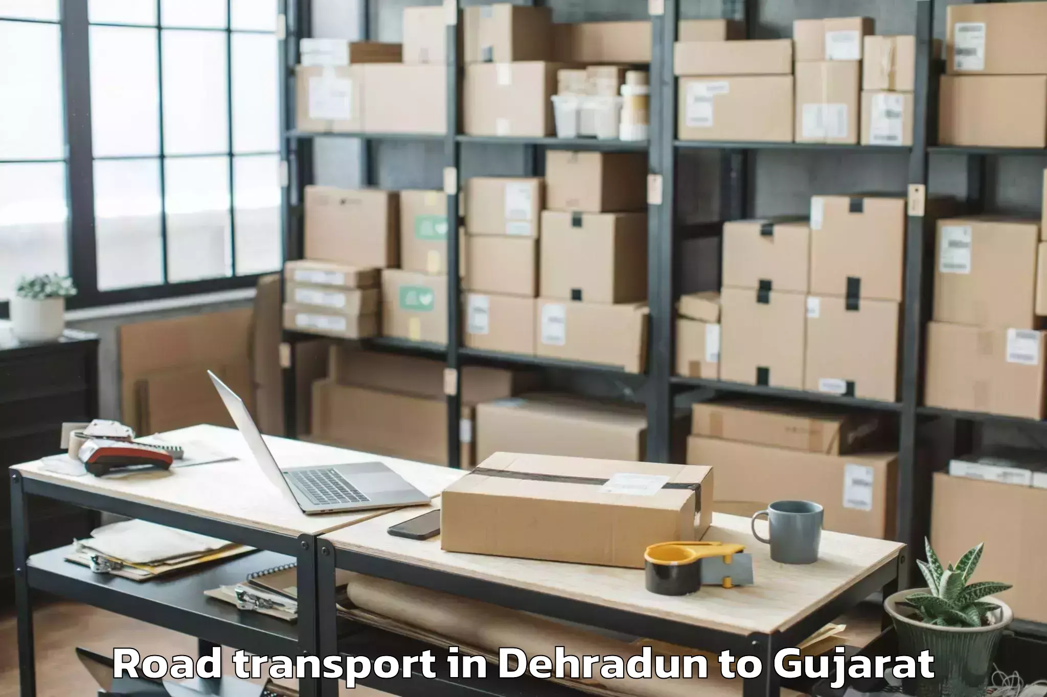 Top Dehradun to Khambhaliya Road Transport Available